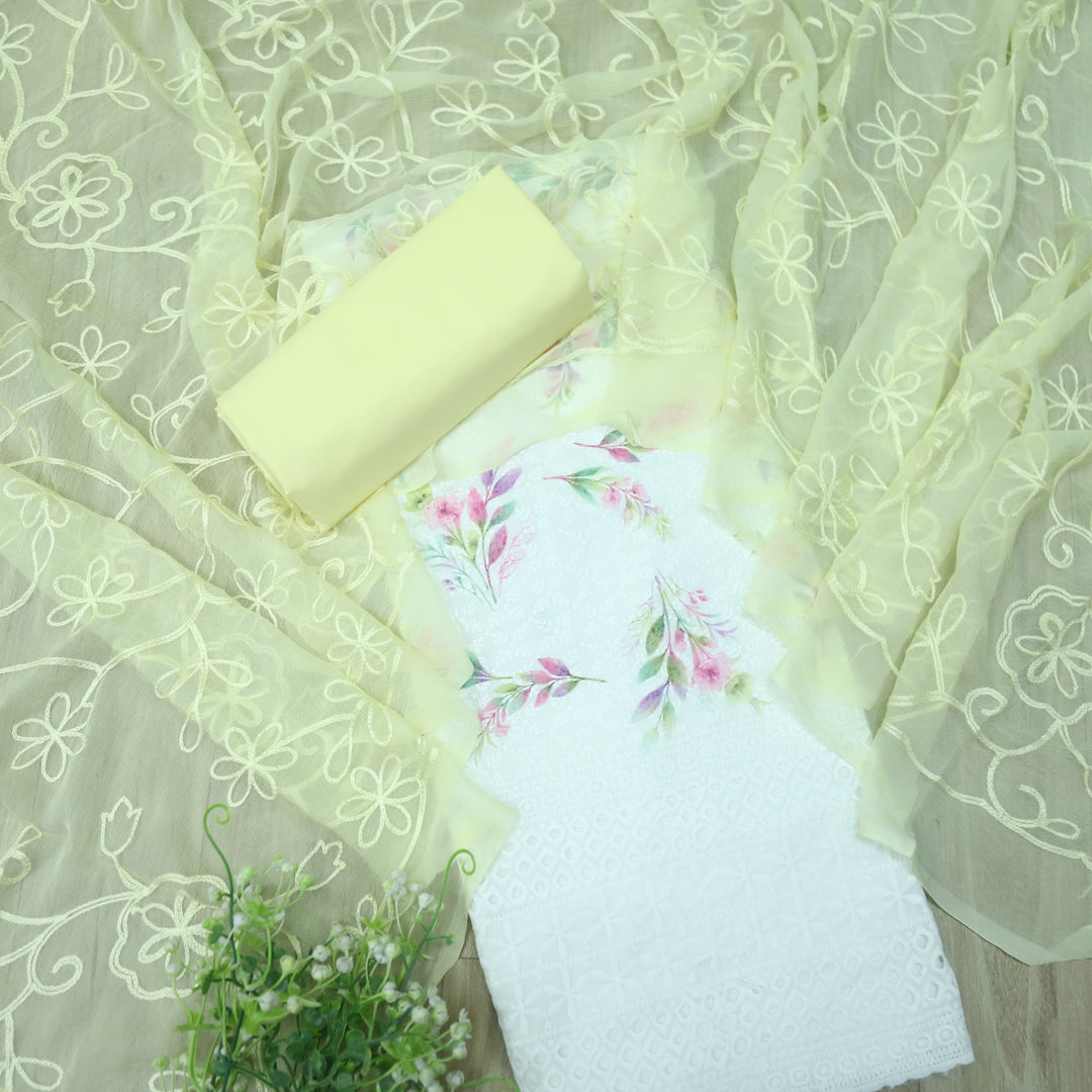 Hamsafar White with Buttermilk Yellow Floral Printed Schiffli Work Cotton Suit Set