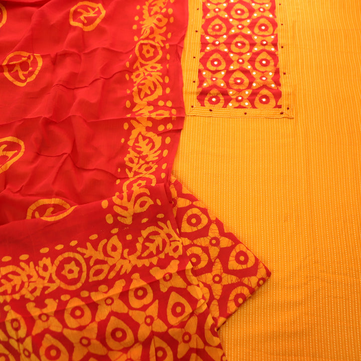 Sanskriti Tangerine Orange Batik Print with Patra Work Rinning Stitch Cotton Suit Set D1