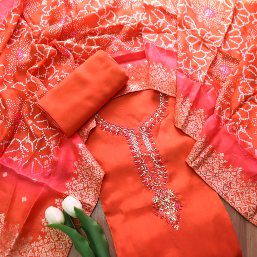 Shreya Tangerine Orange Embellished Kardana Work Neck in Dola Silk Set