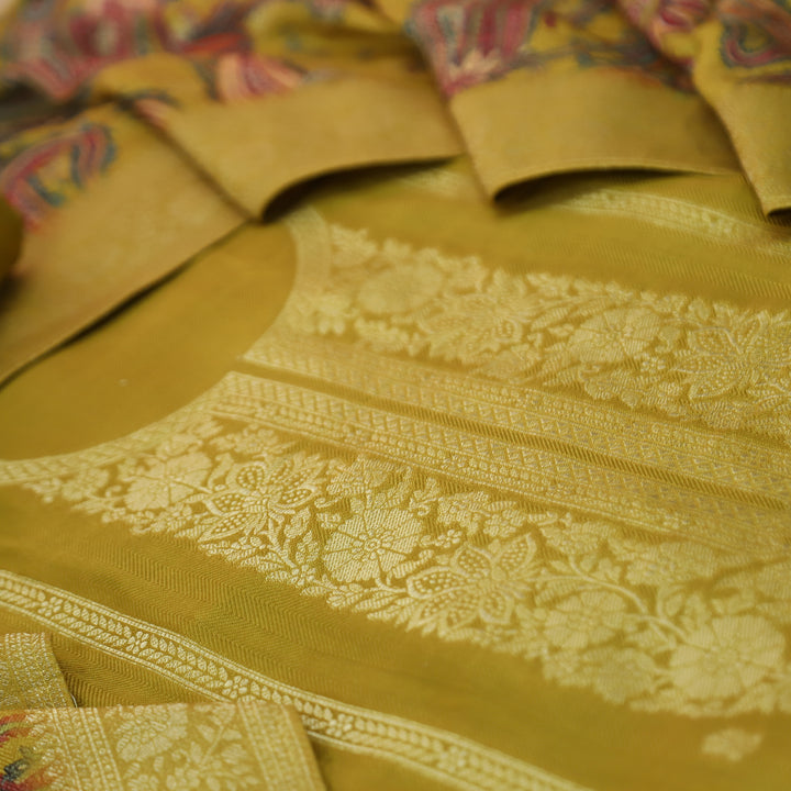 रुक्मणी Dandelion Yellow Zari Weaved in Panel Style Work Semi Pashmina Winter Suit Set