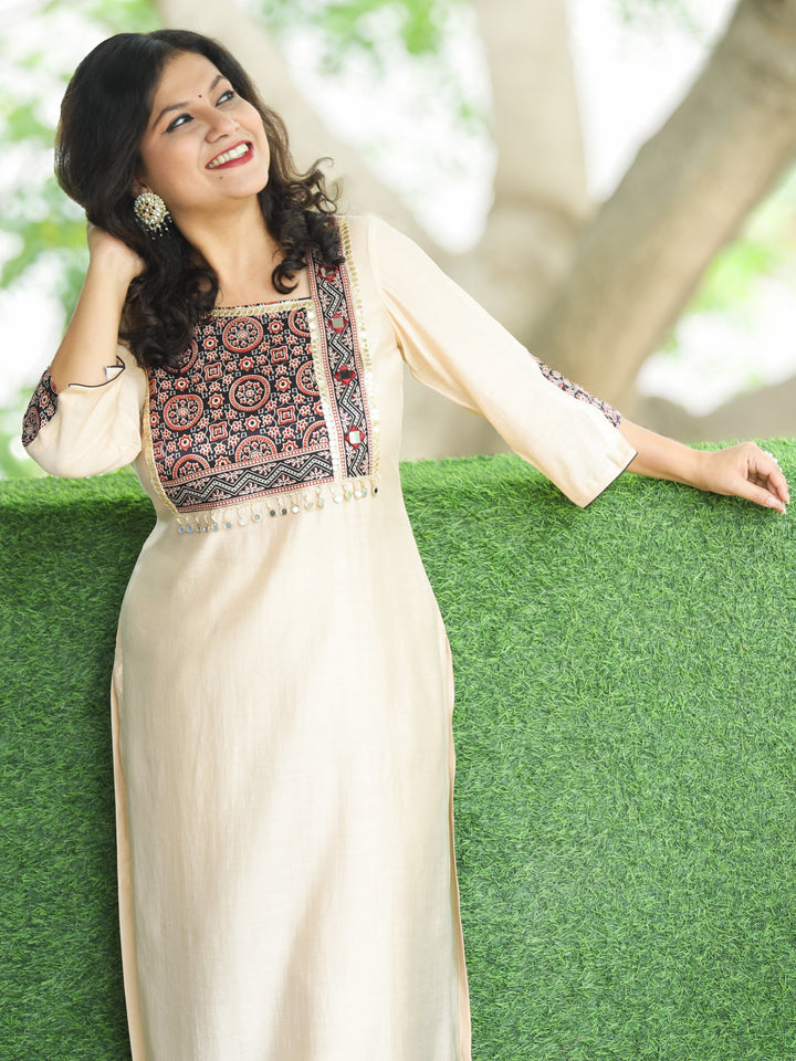 Nirvi Shell Beige Mashru Patch Work Neck with Mirror Work Roman Silk Kurti
