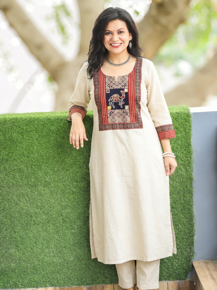 Megha Shwll White Mirror Work Camel Yoke Cotton Kurti