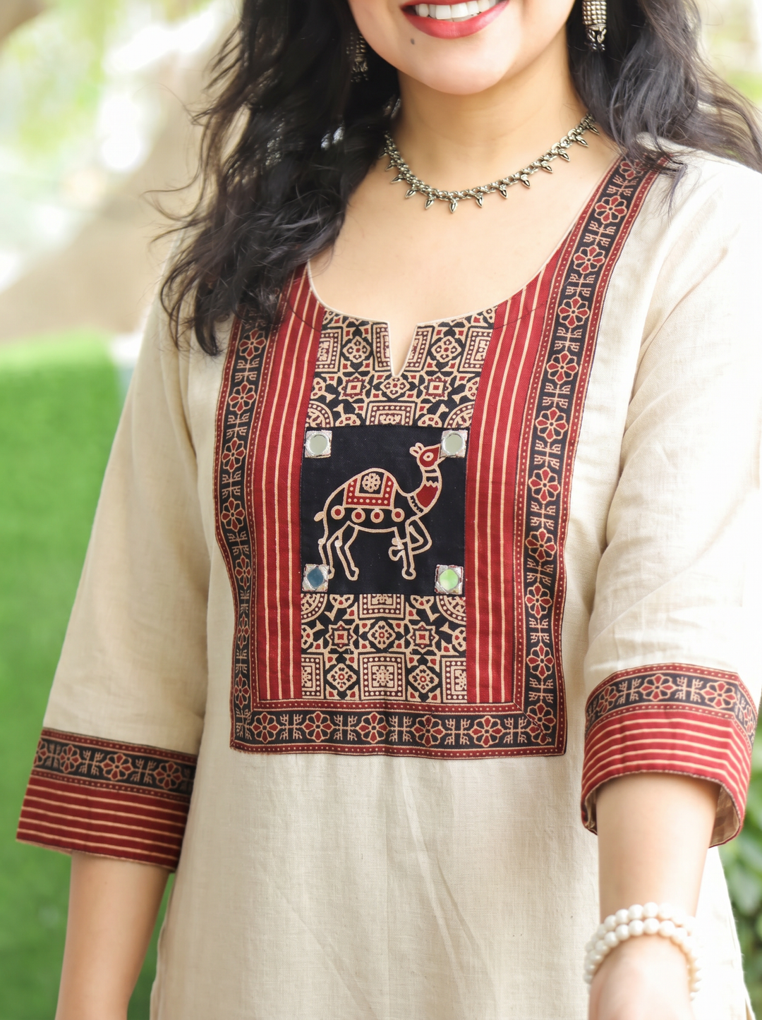 Megha Shwll White Mirror Work Camel Yoke Cotton Kurti