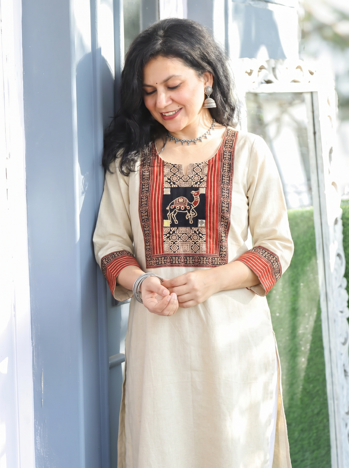 Megha Shwll White Mirror Work Camel Yoke Cotton Kurti