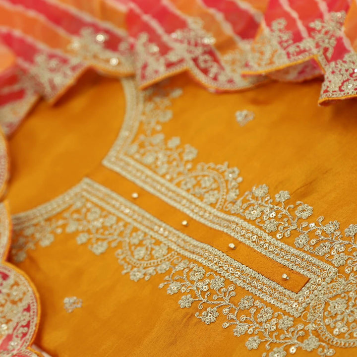 Himayati Yam Orange Designer Neck work Dola Silk Top with Leheriya Print Organza Dupatta Set