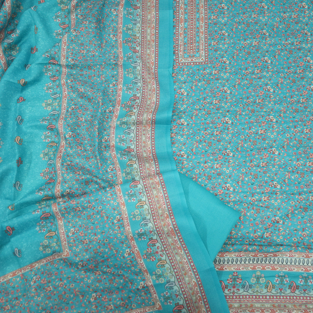 Ruhaan Aqua Blue Floral Kanni Printed Semi Pashmina Suit Set