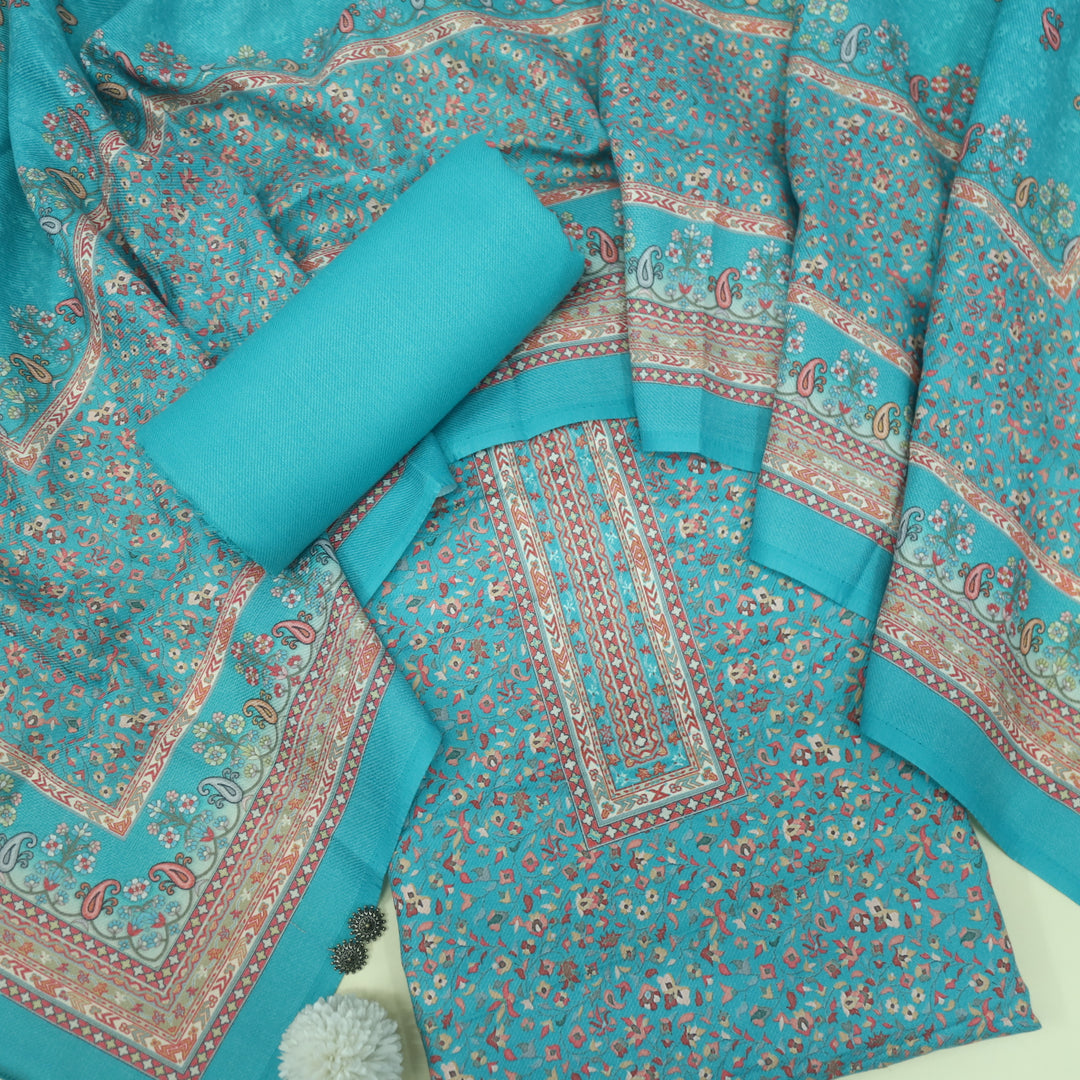 Ruhaan Aqua Blue Floral Kanni Printed Semi Pashmina Suit Set