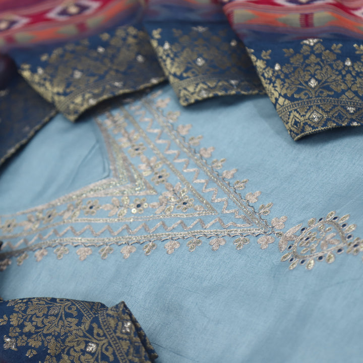 Sufiya Sky Blue V Neck Zari Work Embroidery Dola Silk Suit Set