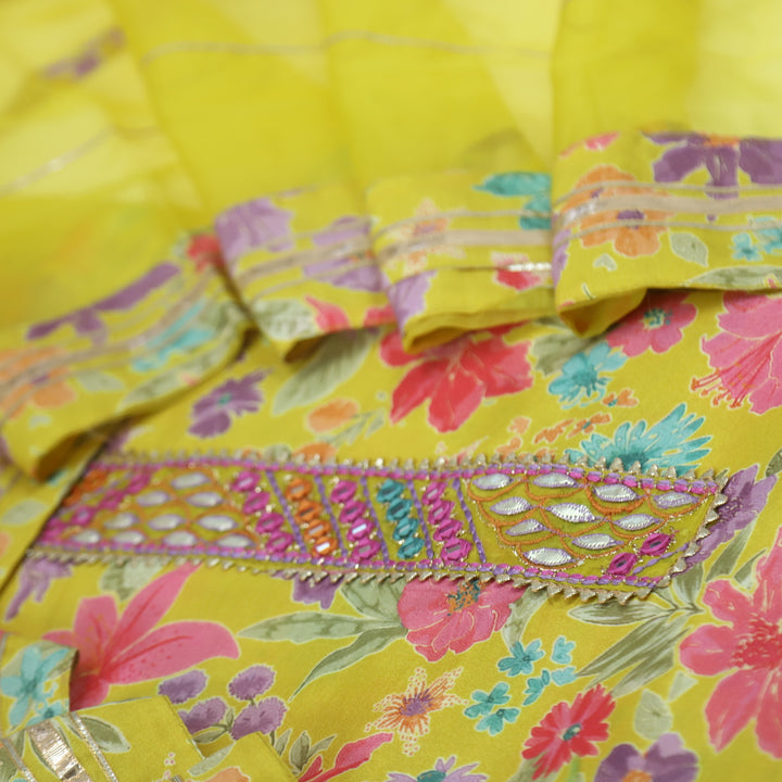 Adaakari Canary Yellow Embellished Neck Floral Print Muslin Suit Set