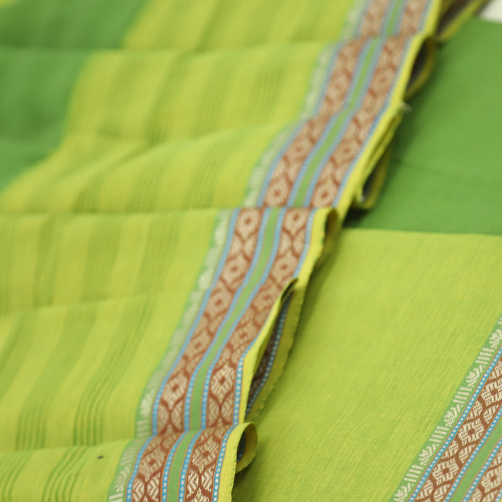 Sanskruti Parrot Green South Cotton Temple Hem Suit Set
