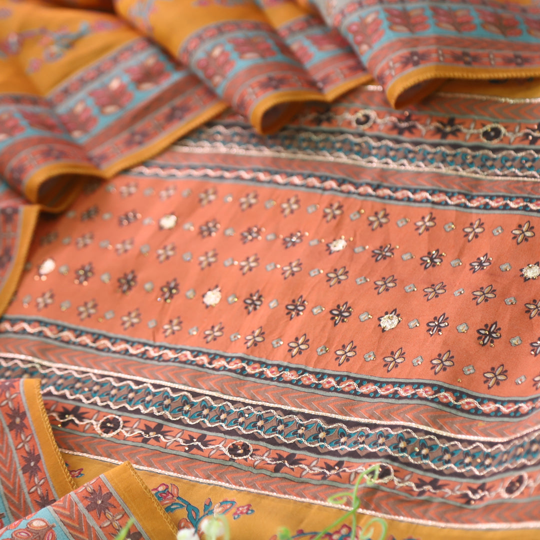 Darshanavi Mustard Orange with Digital Printed Swarovski Work Muslin Suit Set