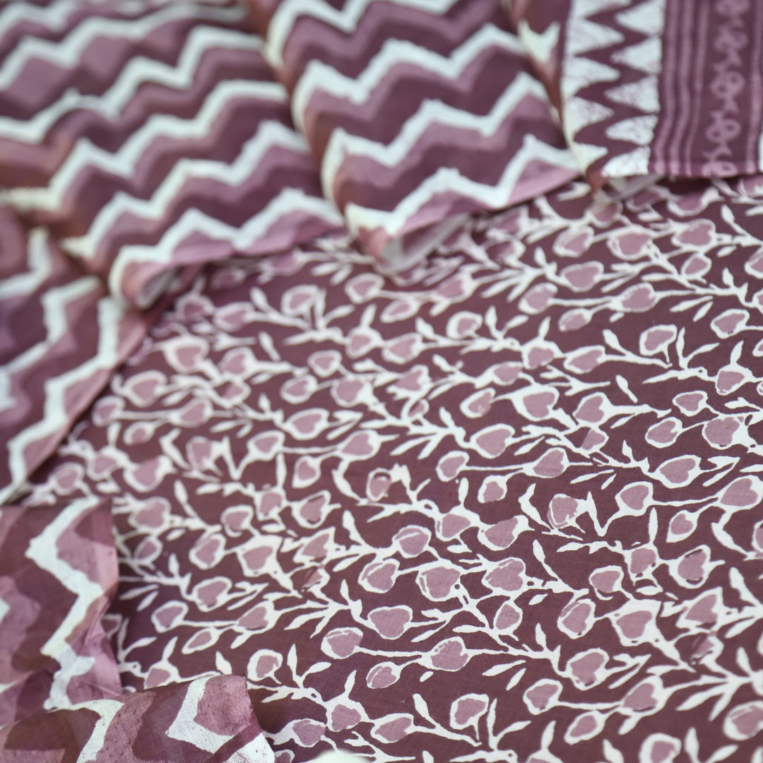 Kashish Dark Cranberry Purple All Over Printed Cotton Suit Set