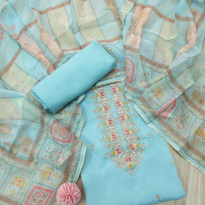 Paheli Cyan Blue Moti and Kardana Embellished Neck Oraganza Suit Set