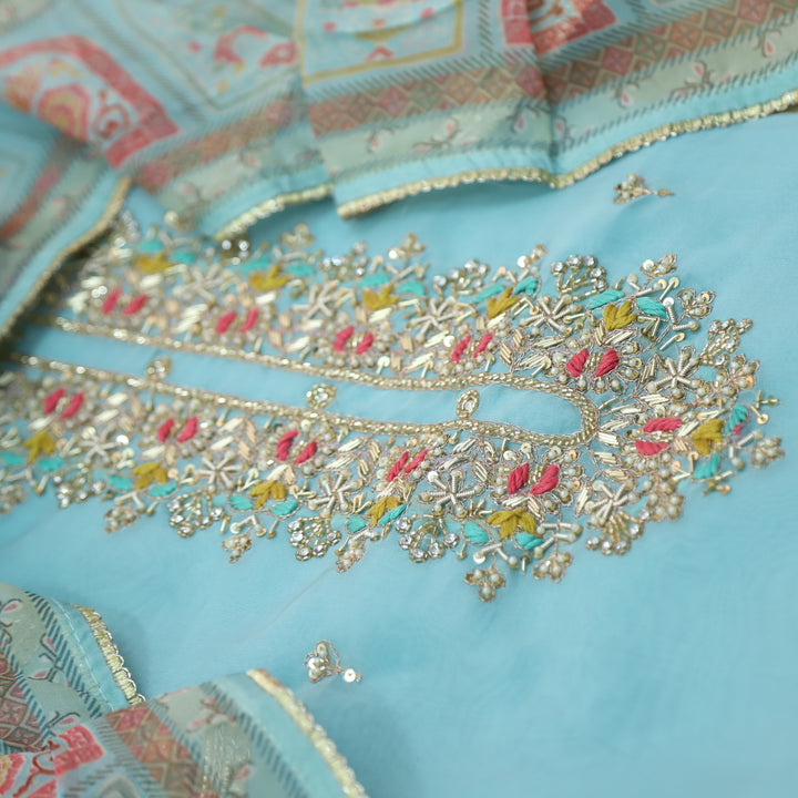 Paheli Cyan Blue Moti and Kardana Embellished Neck Oraganza Suit Set