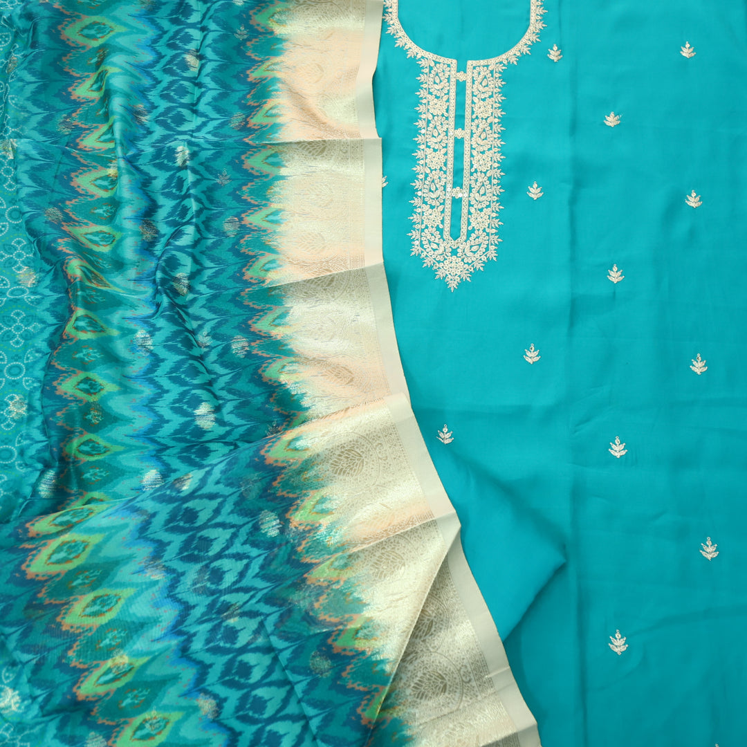 Ishaani Aqua Blue Embellish Zari Neck Work Modal Suit Set