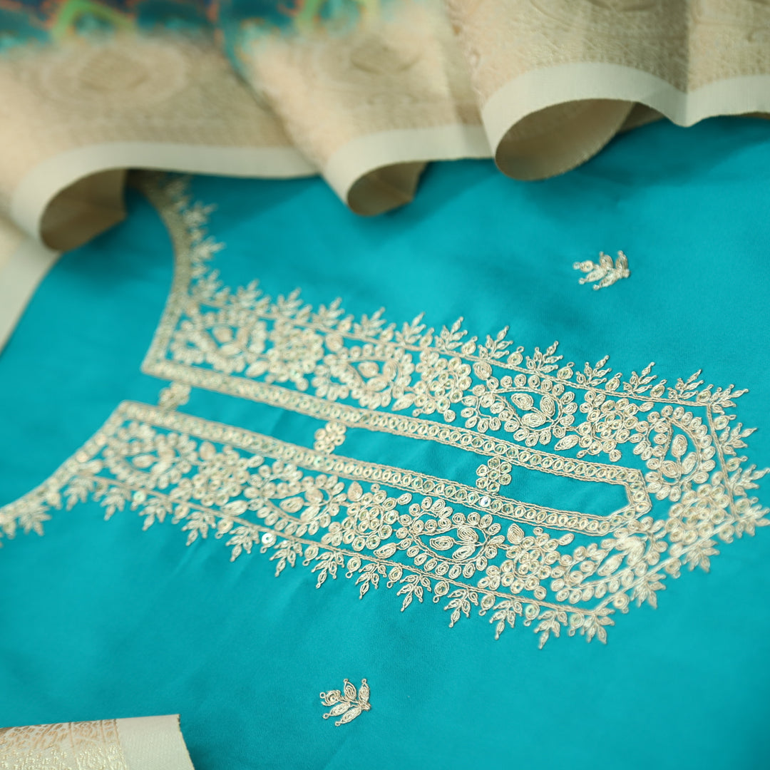 Ishaani Aqua Blue Embellish Zari Neck Work Modal Suit Set