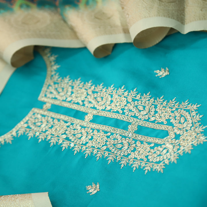 Ishaani Aqua Blue Embellish Zari Neck Work Modal Suit Set