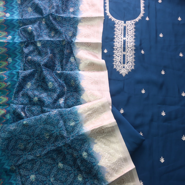 Ishaani Peacock Blue Embellish Zari Neck Work Modal Suit Set