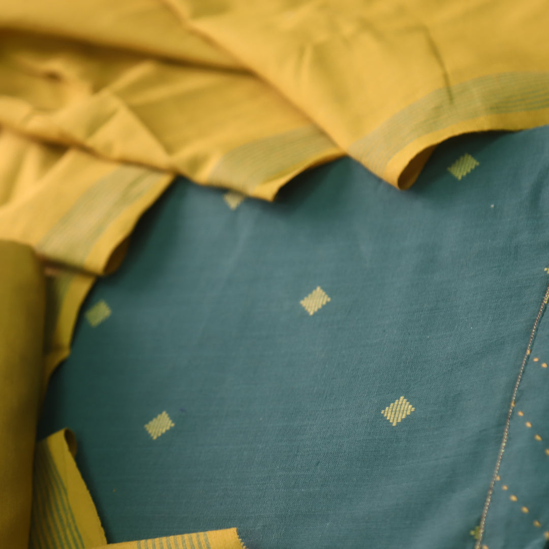 Madhubala Sac. Green with Yellow All Over Thread Weaved Handloom Cotton Suit Set