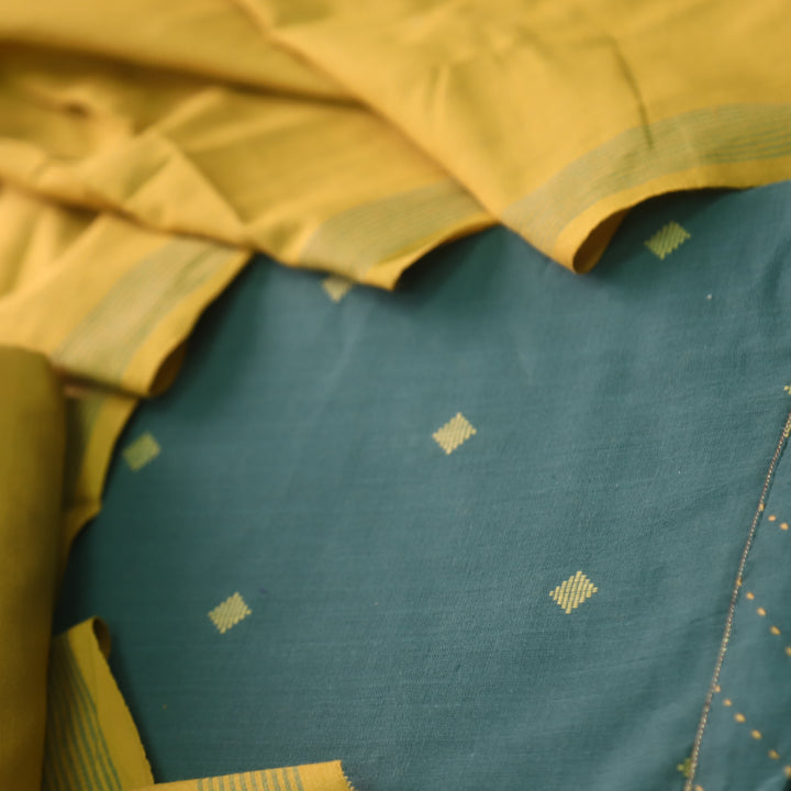 Madhubala Sac. Green with Yellow All Over Thread Weaved Handloom Cotton Suit Set