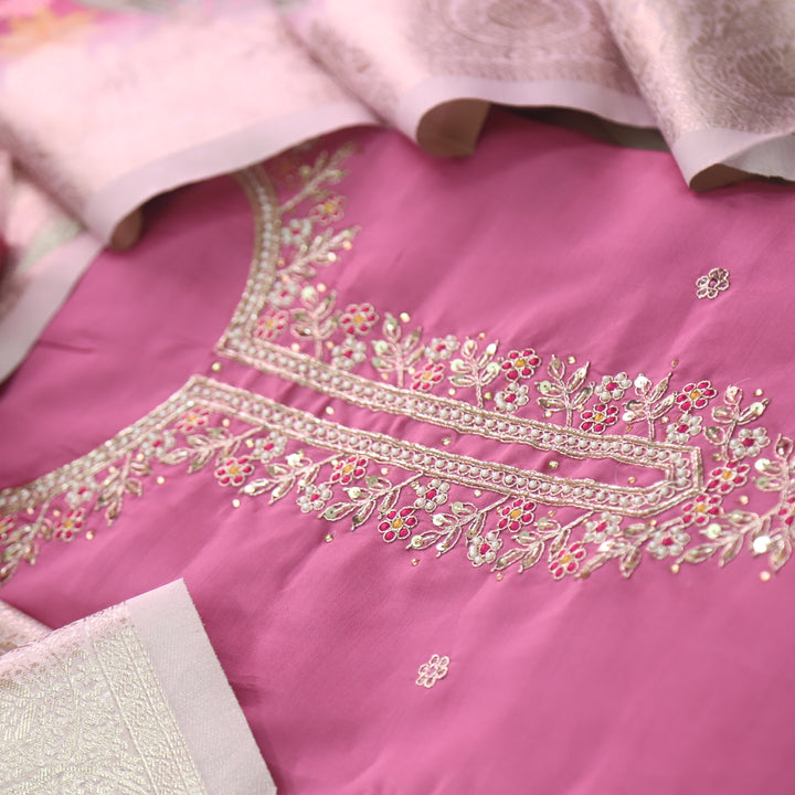 Ishaani Flamingo Pink Embellished Neck with Moti Work Modal Suit Set