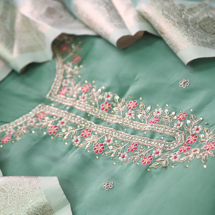 Ishaani Sage Cyan Green Embellished Neck with Moti Work Modal Suit Set