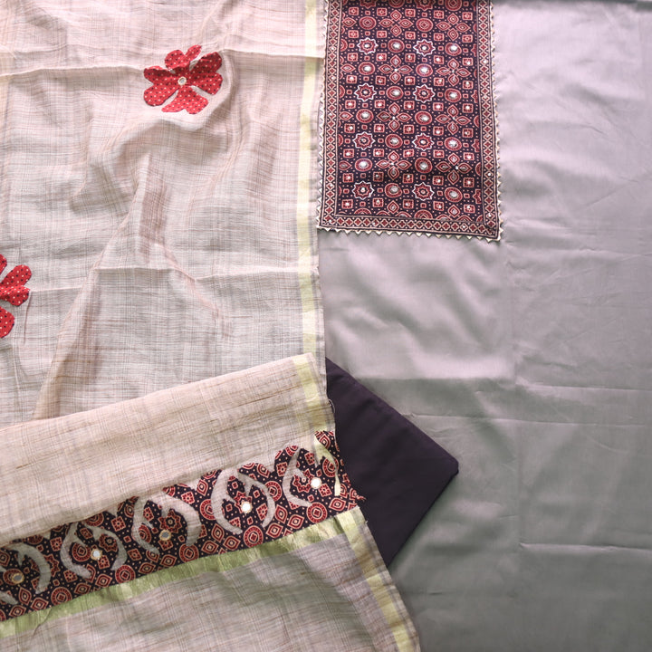 Noor Soil Grey Ajrak Print Neck Patch with Patra Glazed Cotton Suit Set