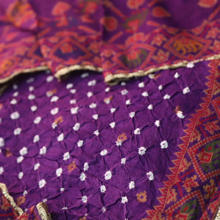 Naari Russian Purple Thread Weaved with All Over Bandhej Work Crepe Silk Suit
