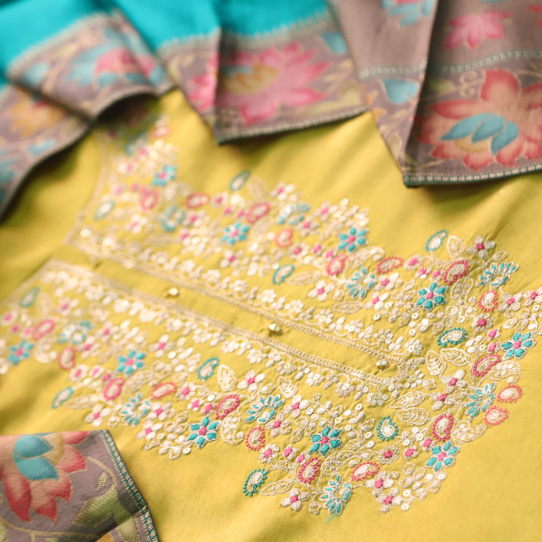 Alvida Canary Yellow Thread Embroidery Neck Dola Silk Suit with Blue Dupatta Set