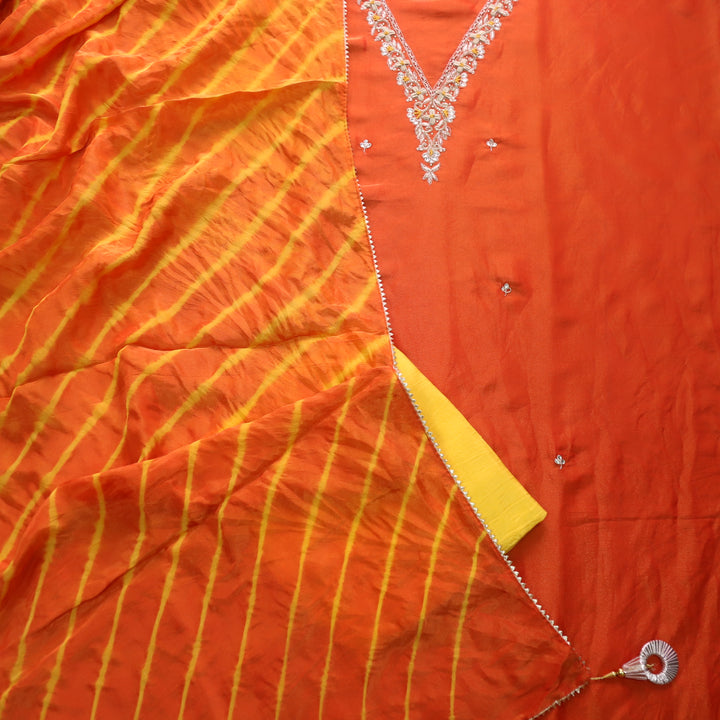 Falak Inter.Orange Embellished Neck Work in Shimmer Tissue Silk Suit Set