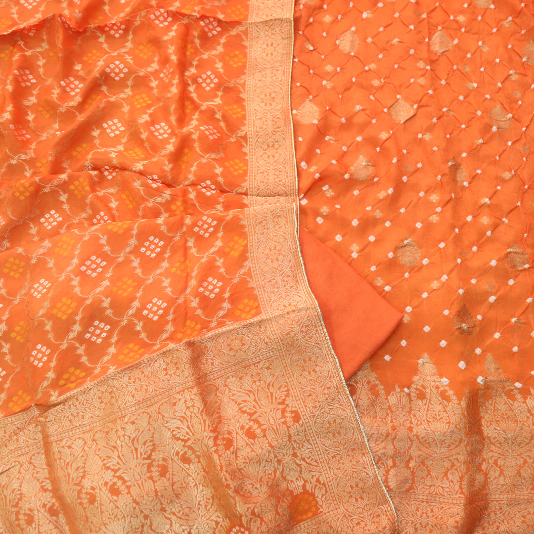 Naari Vivid Orange Zari Weaved with All Over Bandhej Work Crepe Silk Suit