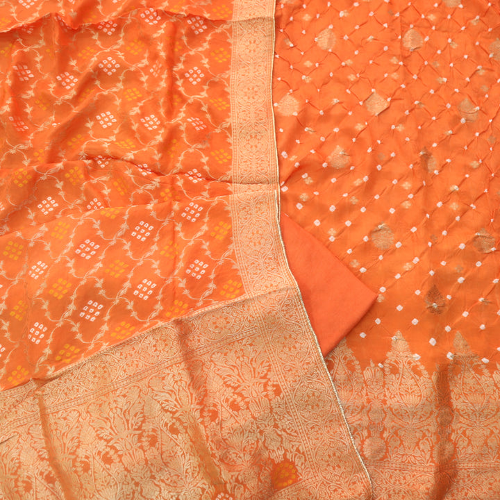Naari Vivid Orange Zari Weaved with All Over Bandhej Work Crepe Silk Suit