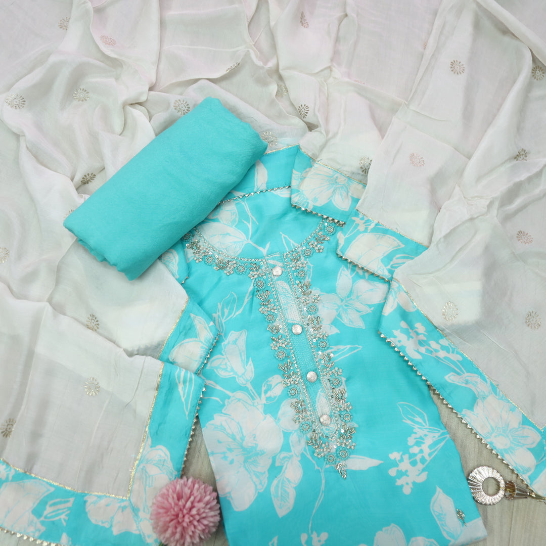 Mannat Aqua Blue Embellished Neck Floral Printed Muslin Suit Set