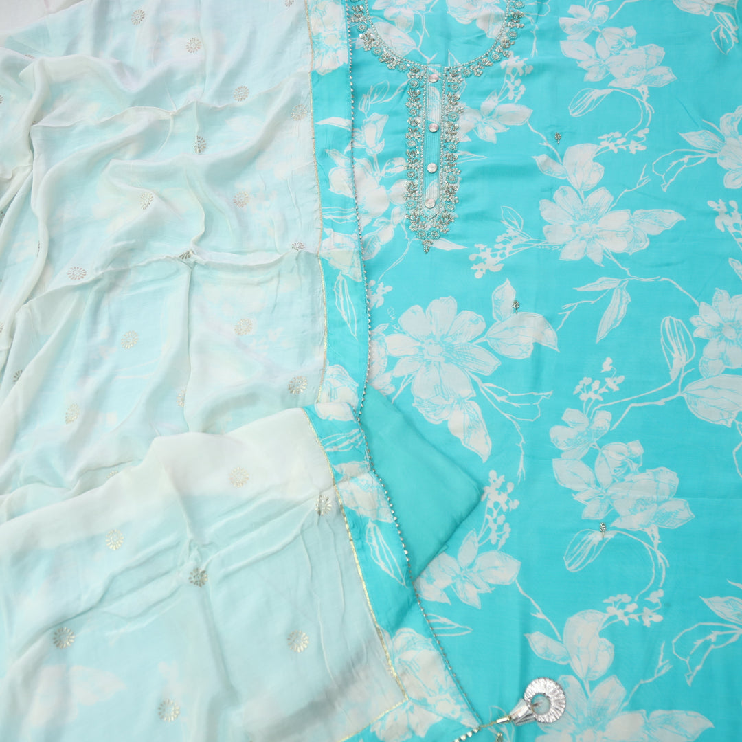 Mannat Aqua Blue Embellished Neck Floral Printed Muslin Suit Set