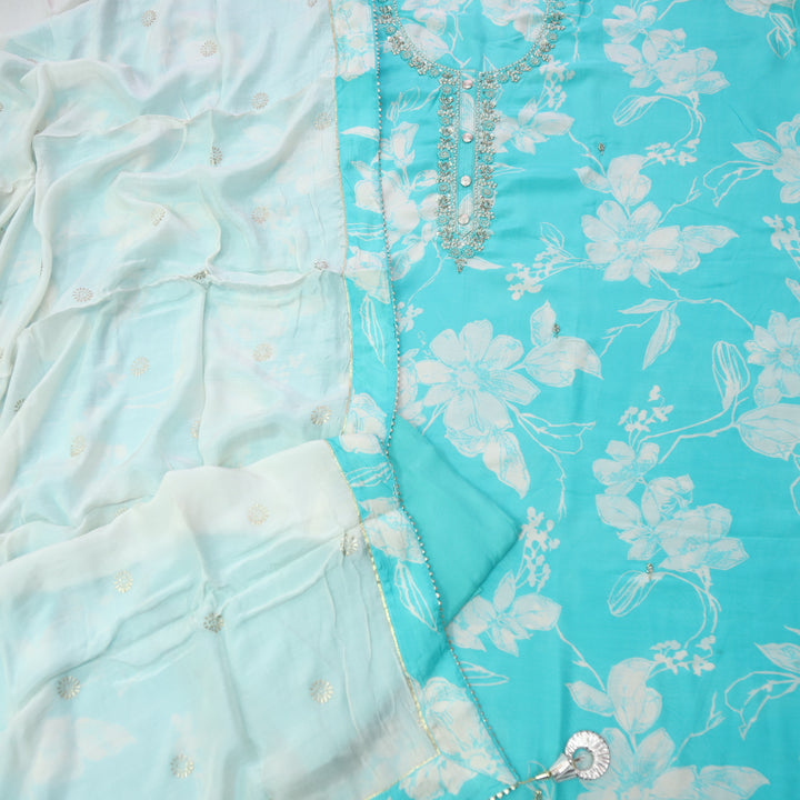 Mannat Aqua Blue Embellished Neck Floral Printed Muslin Suit Set