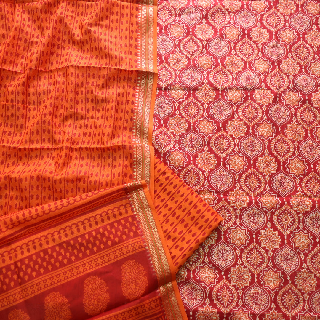 Zinat Coral Orange Ajrak Printed in Mangalgiri Hem Work Cotton Suit Set D1
