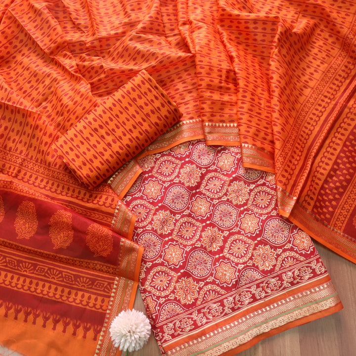Zinat Coral Orange Ajrak Printed in Mangalgiri Hem Work Cotton Suit Set D1