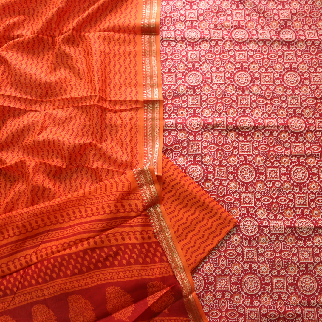 Zinat Coral Orange Ajrak Printed in Mangalgiri Hem Work Cotton Suit Set-D2