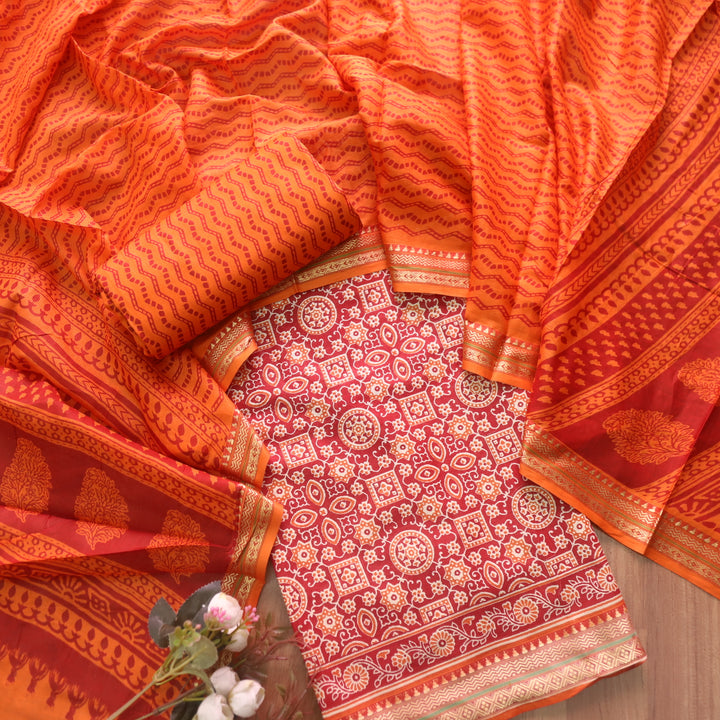 Zinat Coral Orange Ajrak Printed in Mangalgiri Hem Work Cotton Suit Set-D2