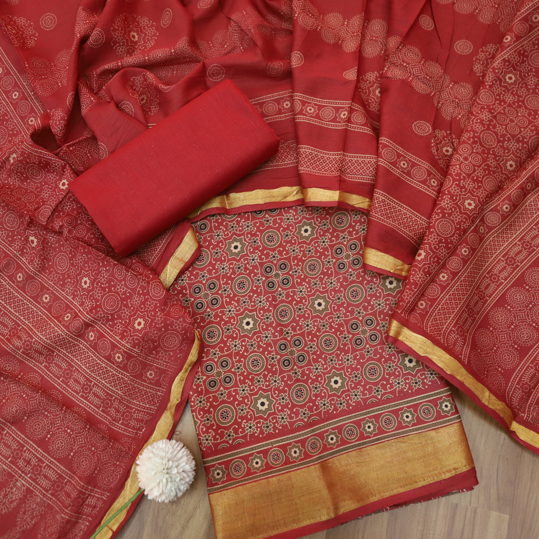 Kranti Berry Red Ajrak Printed Lagdi Patta Hem Work Cotton Suit Set