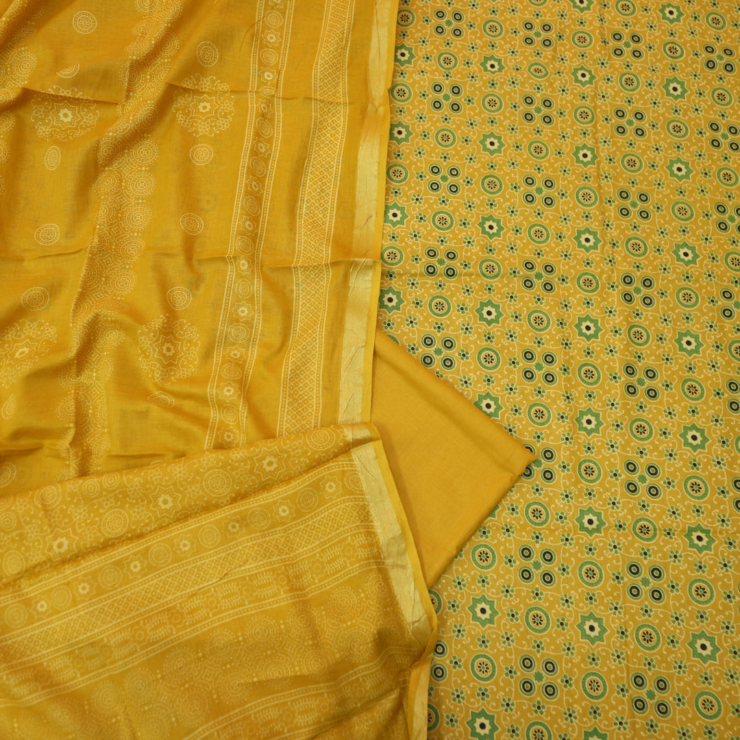 Kranti Canary Yellow Ajrak Printed Lagdi Patta Hem Work Cotton Suit Set