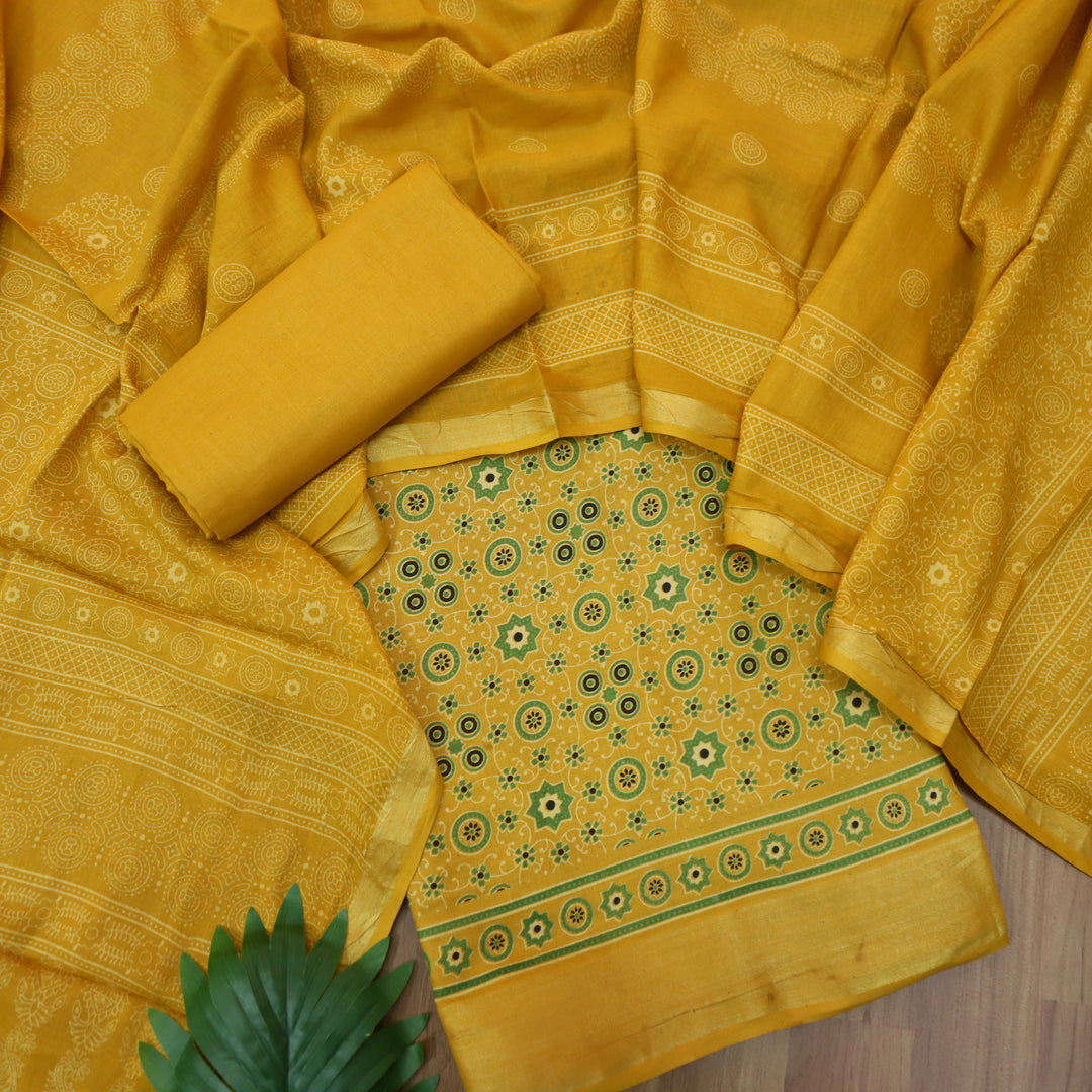 Kranti Canary Yellow Ajrak Printed Lagdi Patta Hem Work Cotton Suit Set