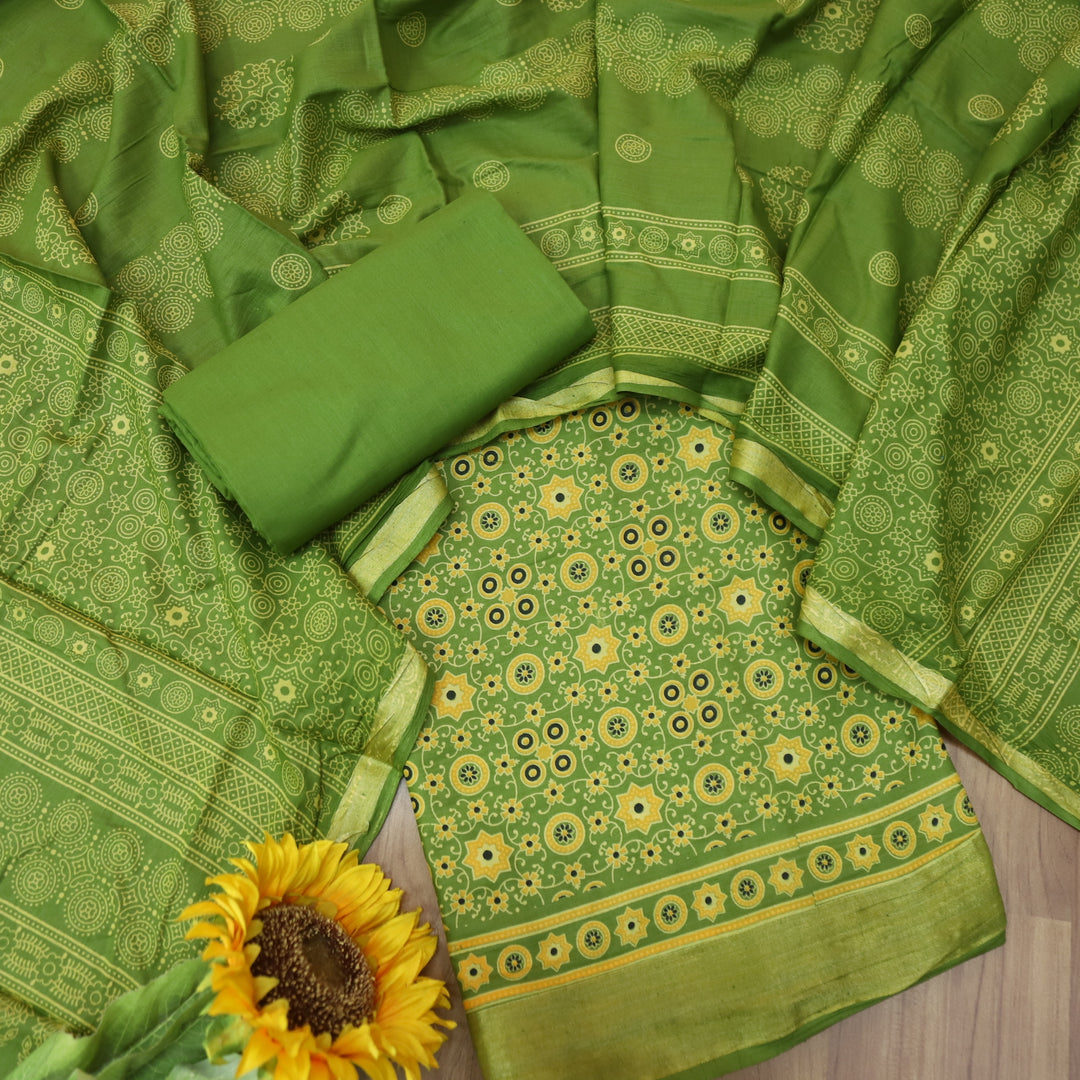 Kranti Grass Green Ajrak Printed Lagdi Patta Hem Work Cotton Suit Set