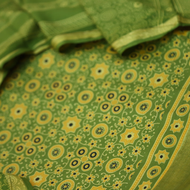 Kranti Grass Green Ajrak Printed Lagdi Patta Hem Work Cotton Suit Set