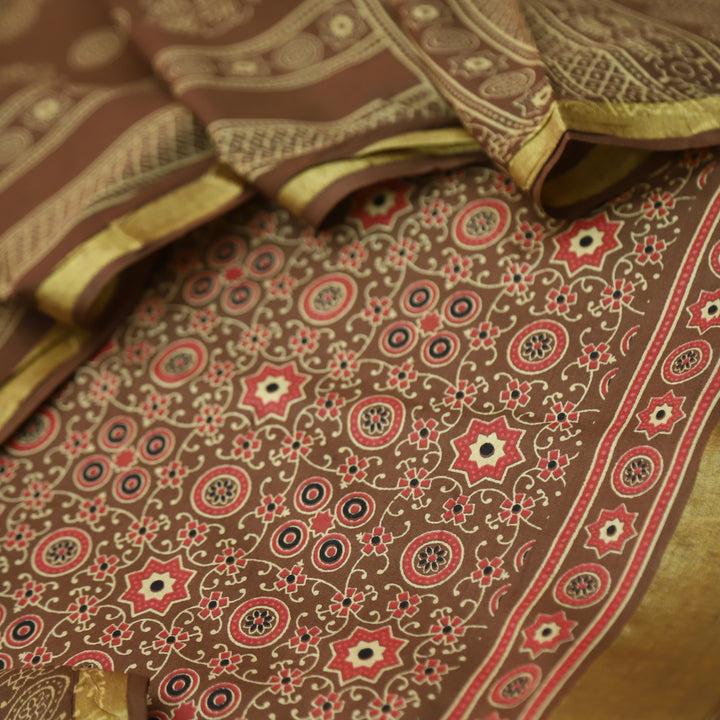 Kranti Choco Brown Ajrak Printed Lagdi Patta Hem Work Cotton Suit Set