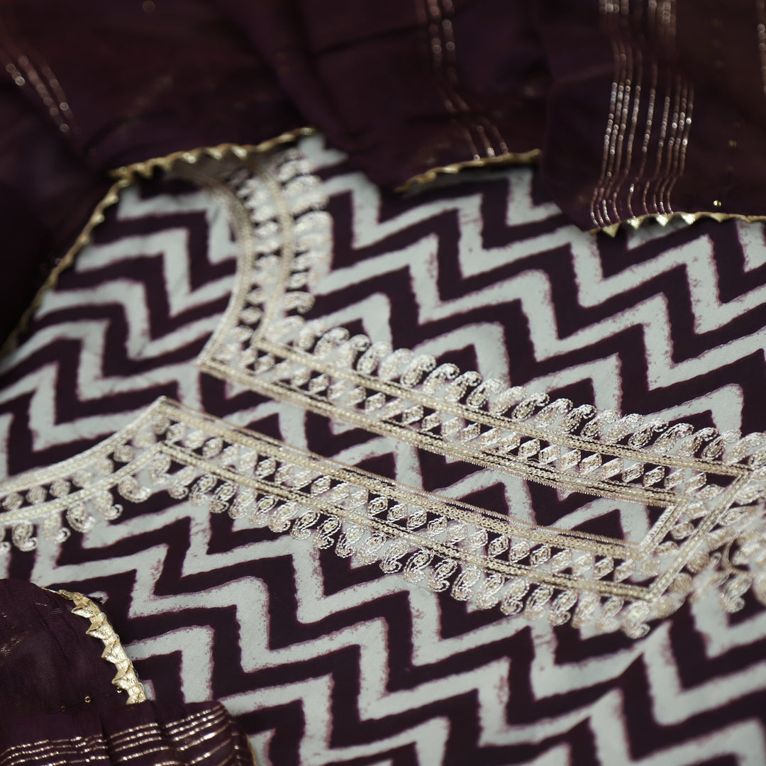 Sajna Dark Wine Purple Embellish Zari Neck Work Leheriya Print Modal Suit Set