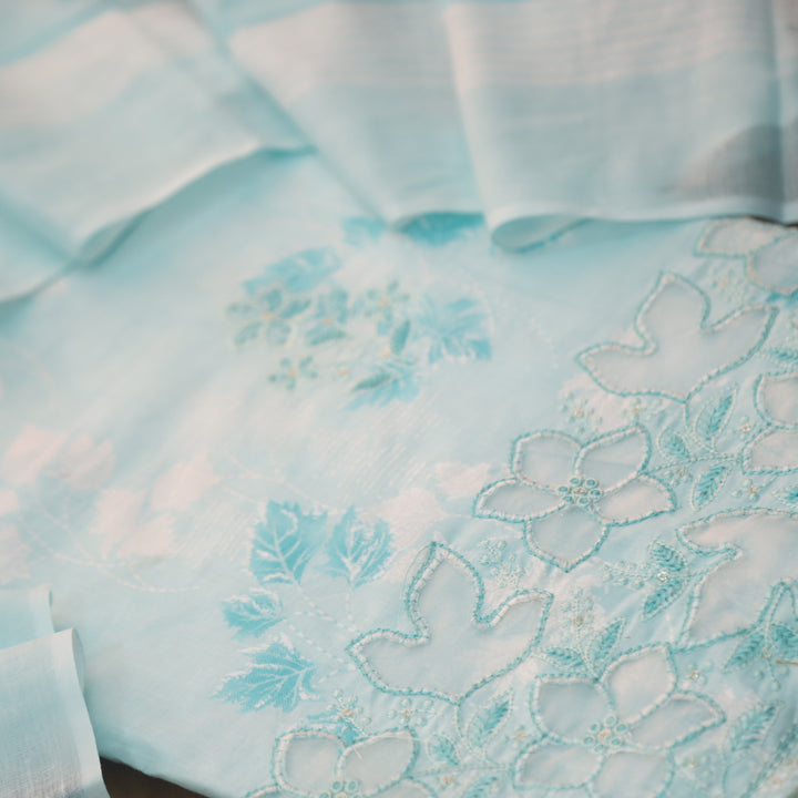 Raavi Aqua Blue Floral Printed Cut Work Hem Thread Work Cotton Suit Set