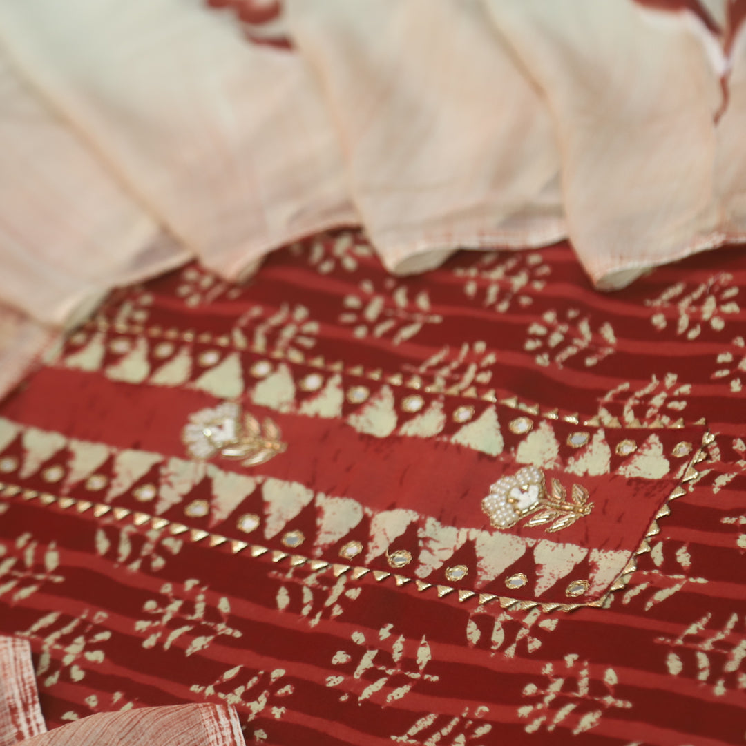 Rubi Tangy Red Moti with Zari Embellish Neck Work Dabu Printed Cotton Suit set
