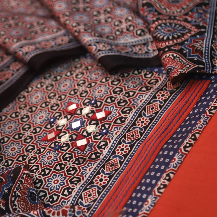Holiya Saffron Orange Mashru Patch with Mirror Work Detailing Cotton Flex Suit Set