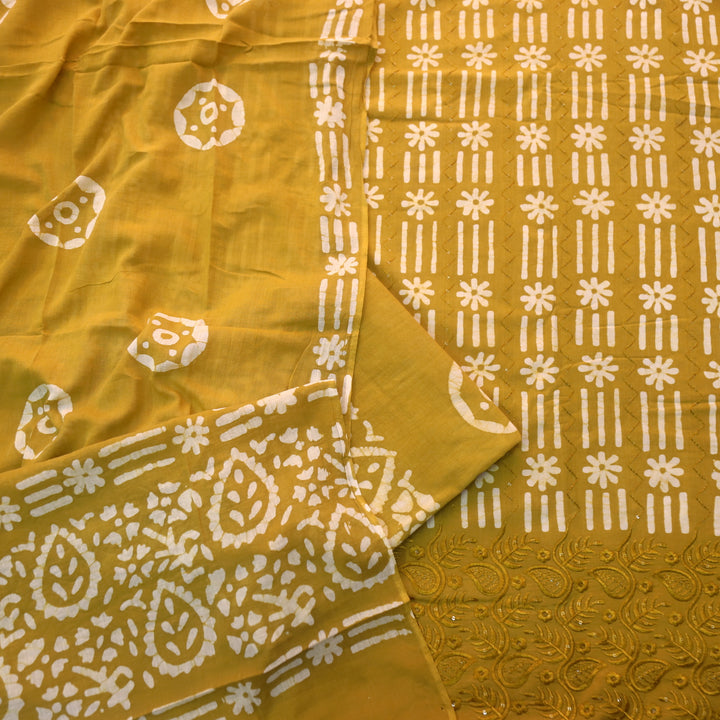 Gulshan Turmeric Yellow Thread Embroidered Hem Batik Printed Cotton Suit Set